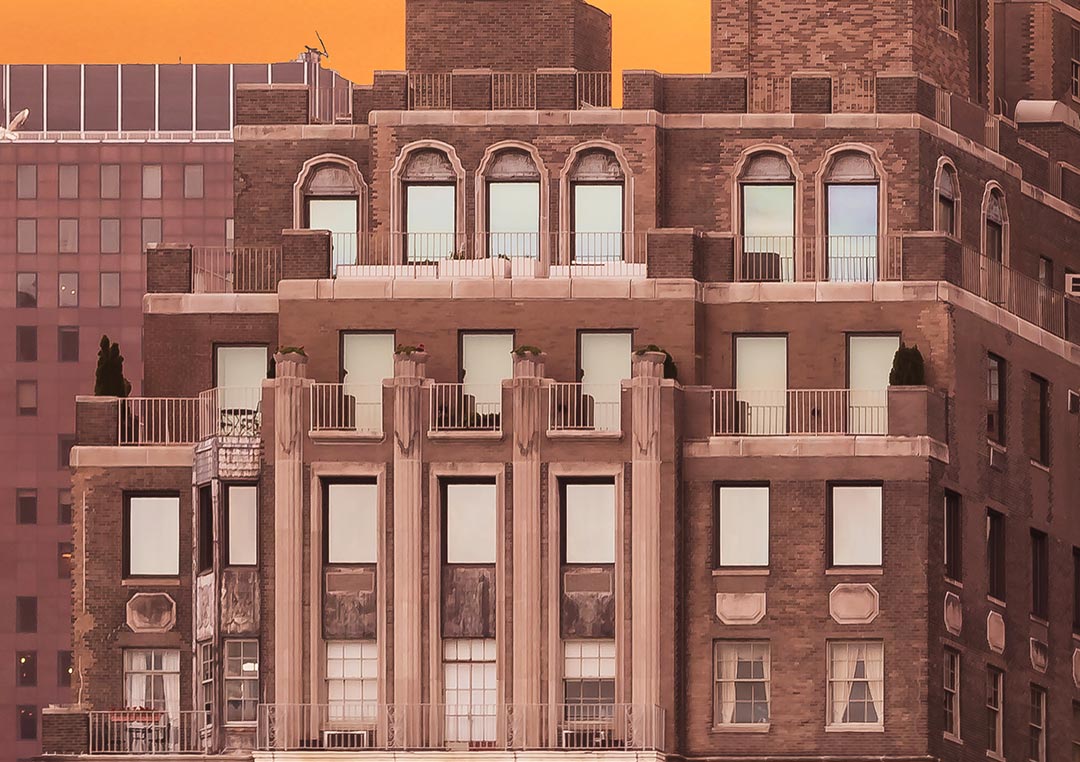 Close up of A very high resolution cityscape VAST photo of the midtown Manhattan city skyline and East River during a beautiful sunset in New York City; created by Dan Piech