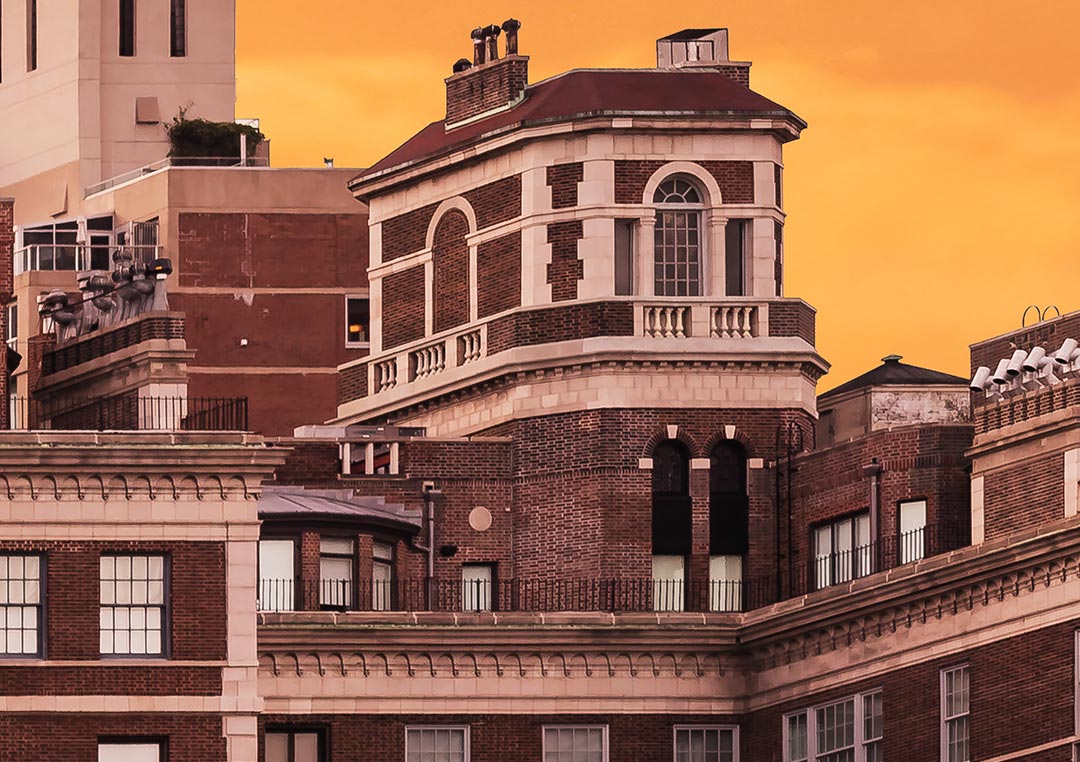 Close up of A very high resolution cityscape VAST photo of the midtown Manhattan city skyline and East River during a beautiful sunset in New York City; created by Dan Piech