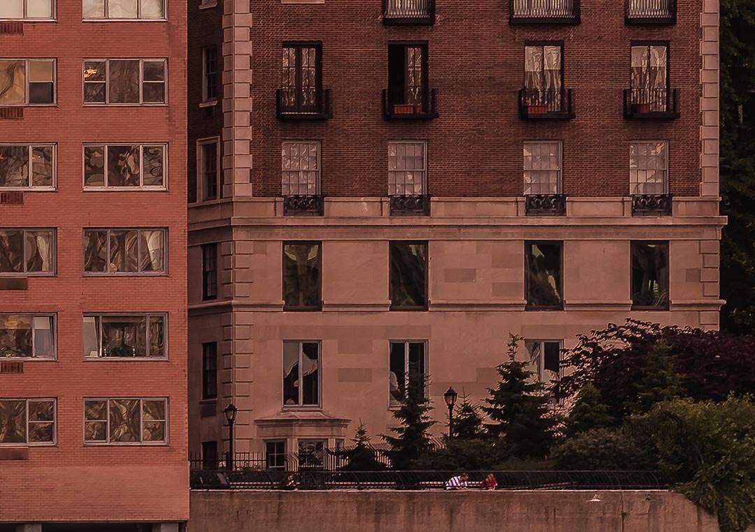 Close up of A very high resolution cityscape VAST photo of the midtown Manhattan city skyline and East River during a beautiful sunset in New York City; created by Dan Piech